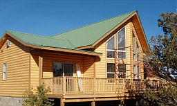 Chicory with 8" pine log siding